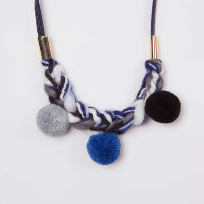 pom pom knit necklace for little girls blue black and grey detail